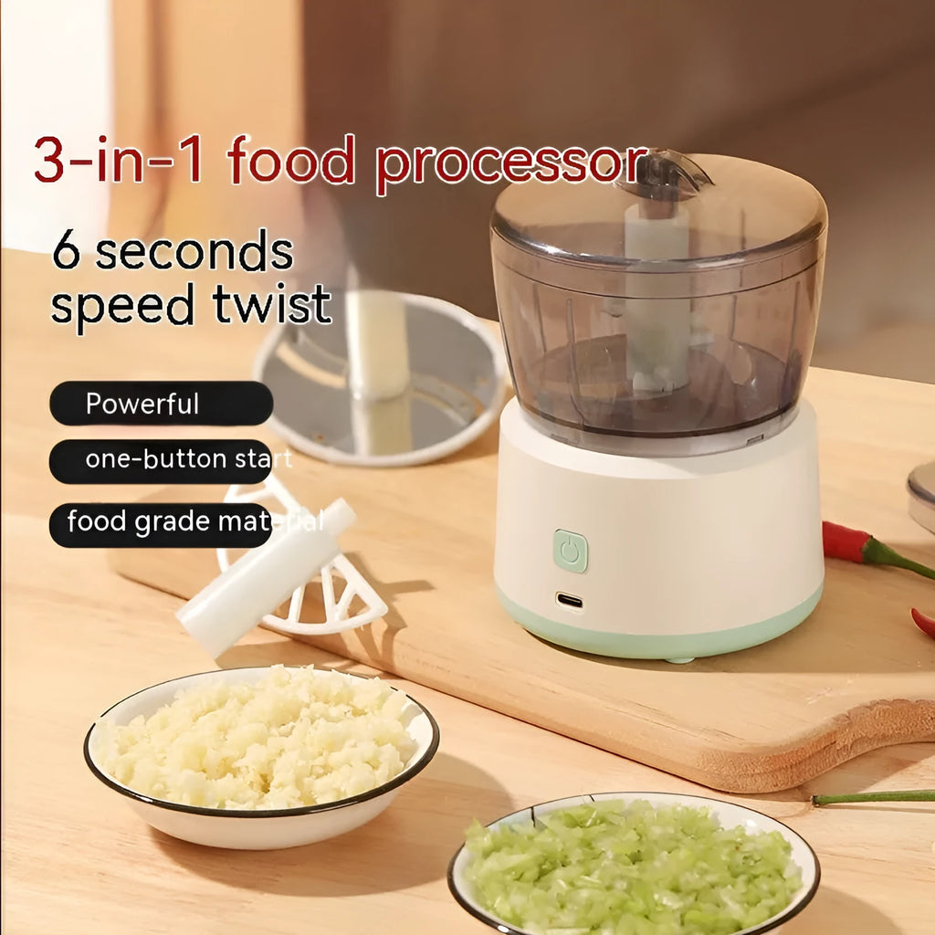 Mini electric meat grinder in light green with transparent cup and stainless steel blades