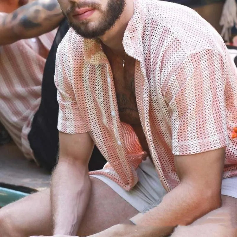 Pink men's loose fit short sleeve cardigan with waffle hole texture on a hanger