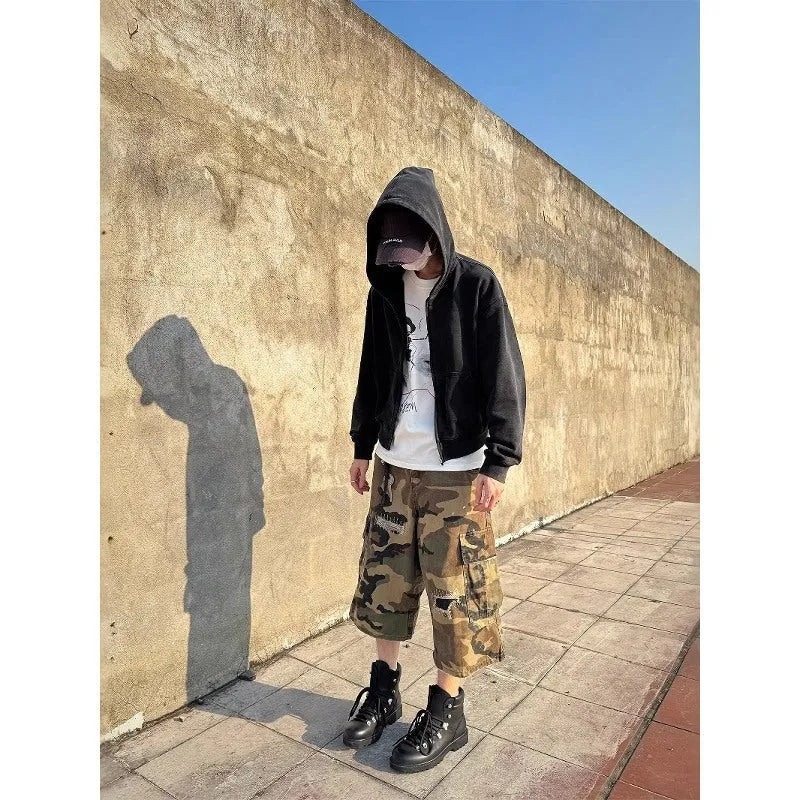 Men's camouflage cropped jeans with retro patches and ripped distressing in straight-leg cut