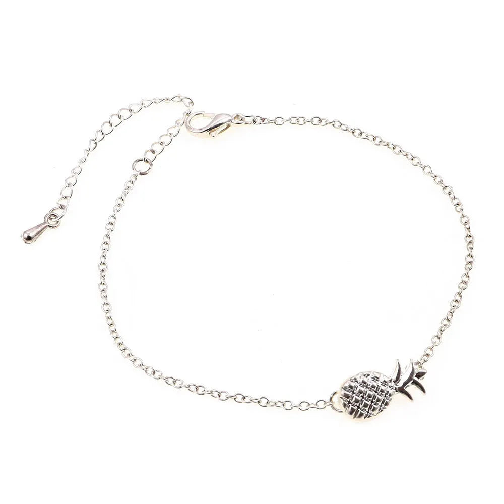Alloy pineapple charm bracelet for women in gold or silver colour from XINGX series.