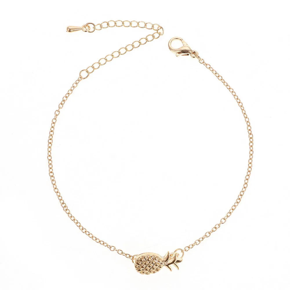 Alloy pineapple charm bracelet for women in gold or silver colour from XINGX series.