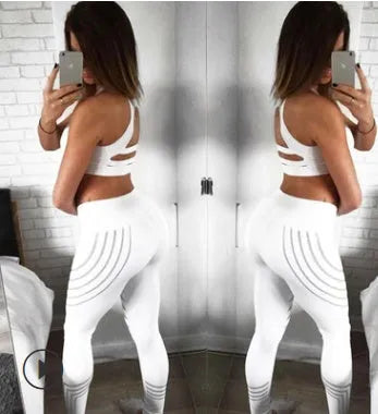 Women's black and white print workout leggings with slim fit pencil pants design.
