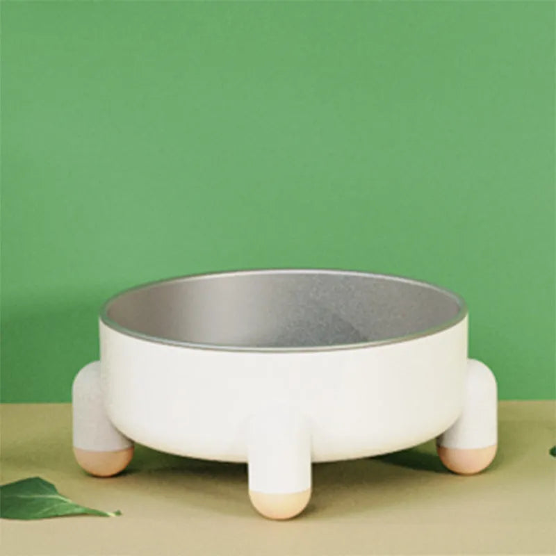 Green stainless steel pet bowl with a high-foot and non-slip base for dogs and cats.