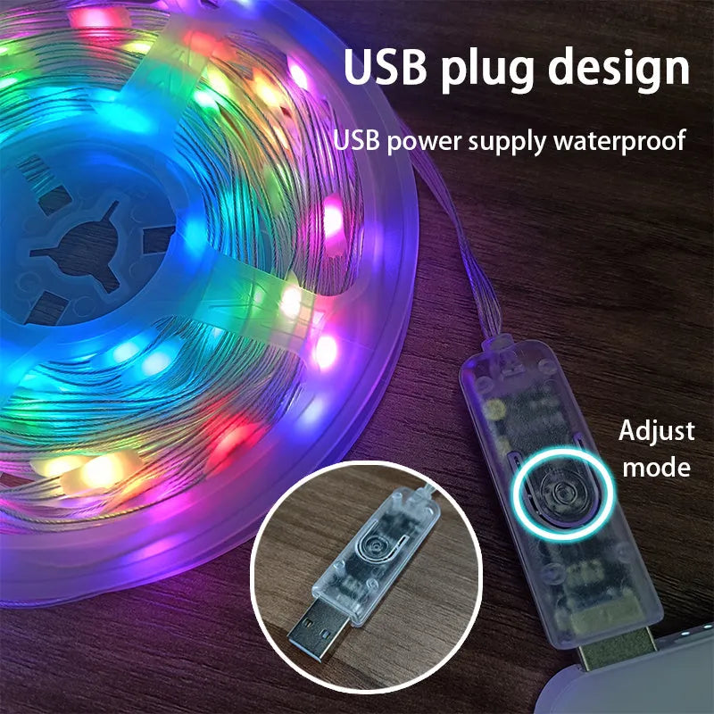 10-metre long multi-colour LED light string with 100 bulbs coiled on a table.