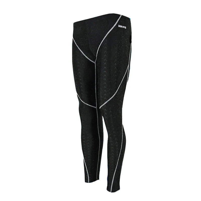 Men's black nylon cropped swimming trunks with a contrast line detail and drawstring waist.