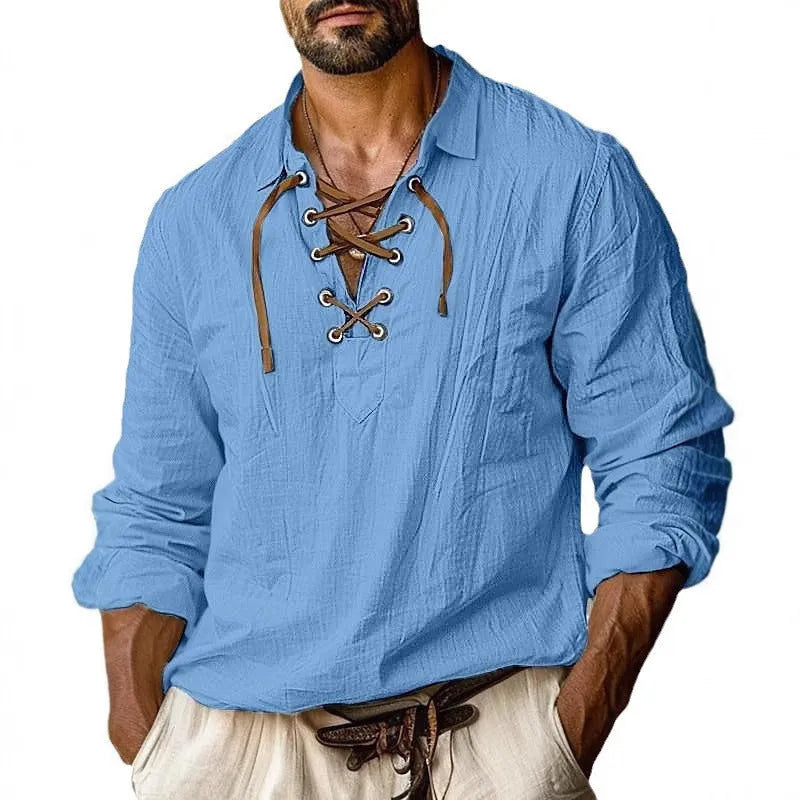 Men's loose fit linen blend shirt with lapels and lace design in blue, shown on a hanger.
