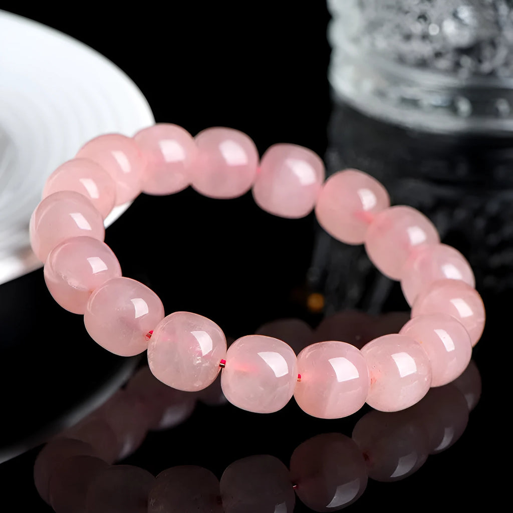 Natural pink crystal barrel bead bracelet with 8x10mm geometric polished beads