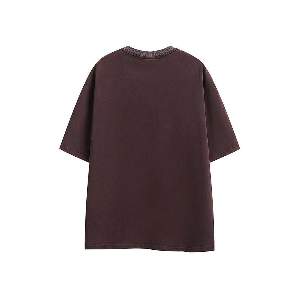 Men's purple cotton loose fit retro embroidered short-sleeve T-shirt laid flat.