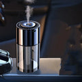 USB plug-in AI intelligent spray perfume humidifier with glass seat in Classic Ocean colour.