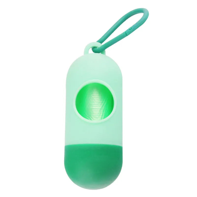 Compact dog poop bag holder with hook and Velcro strap attached to a leash handle, available in multiple colours