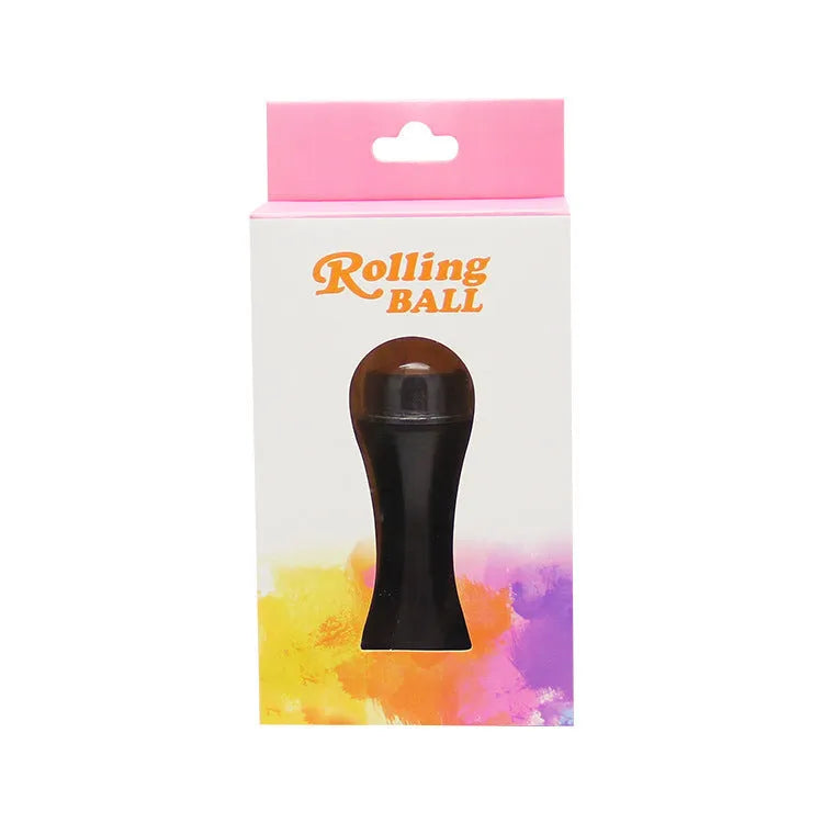 Volcanic stone facial roller in a plastic case for oily skin control, shown in one of four colours.