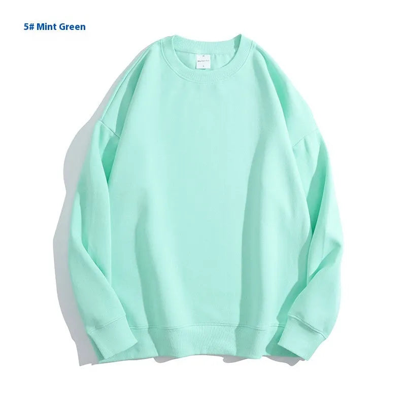 Cotton off shoulder loose pullover sweater in a solid colour with round neck and long sleeves.