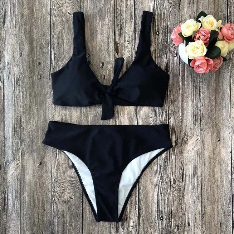Ladies' polyester bikini set in solid red colour, showing bra top and briefs.