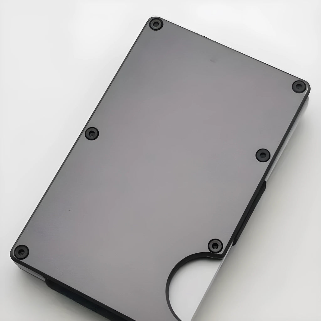 Carbon fibre credit card wallet in aluminium alloy grey showing RFID blocking and card storage