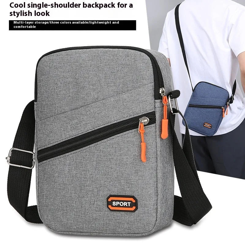 Oxford cloth crossbody commuter bag in black, navy blue or silver grey with urban simplicity styling