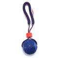 Blue or red natural rubber dog ball on rope toy measuring 29cm total length with 6.5cm diameter ball