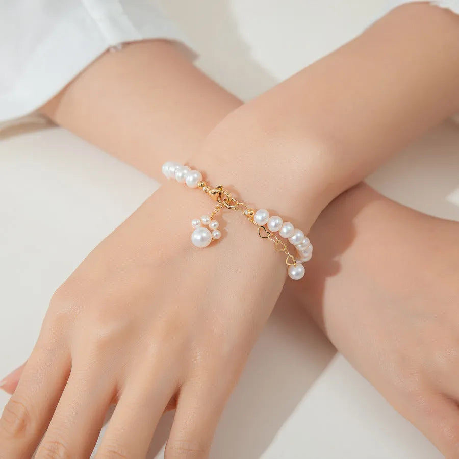 White freshwater pearl cat paw bracelet with electroplated finish for women