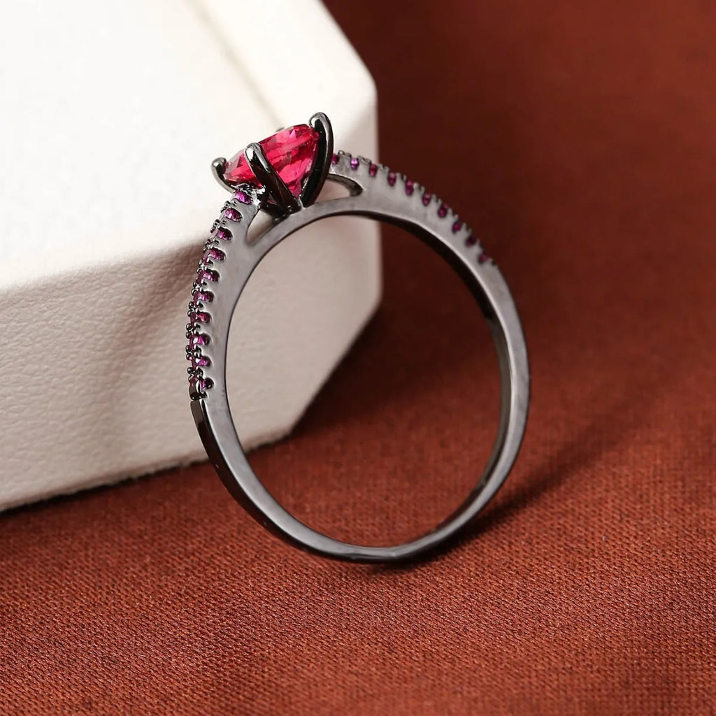 Hexagonal geometric zircon ring in copper with electroplated finish showing angular design and zircon stone