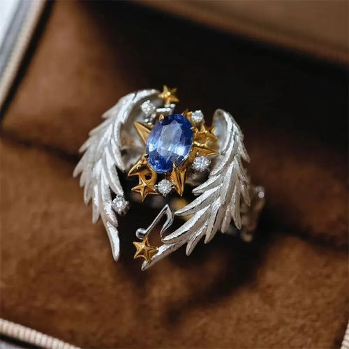 Geometric adjustable alloy ring with open mouth design showing metallic finish
