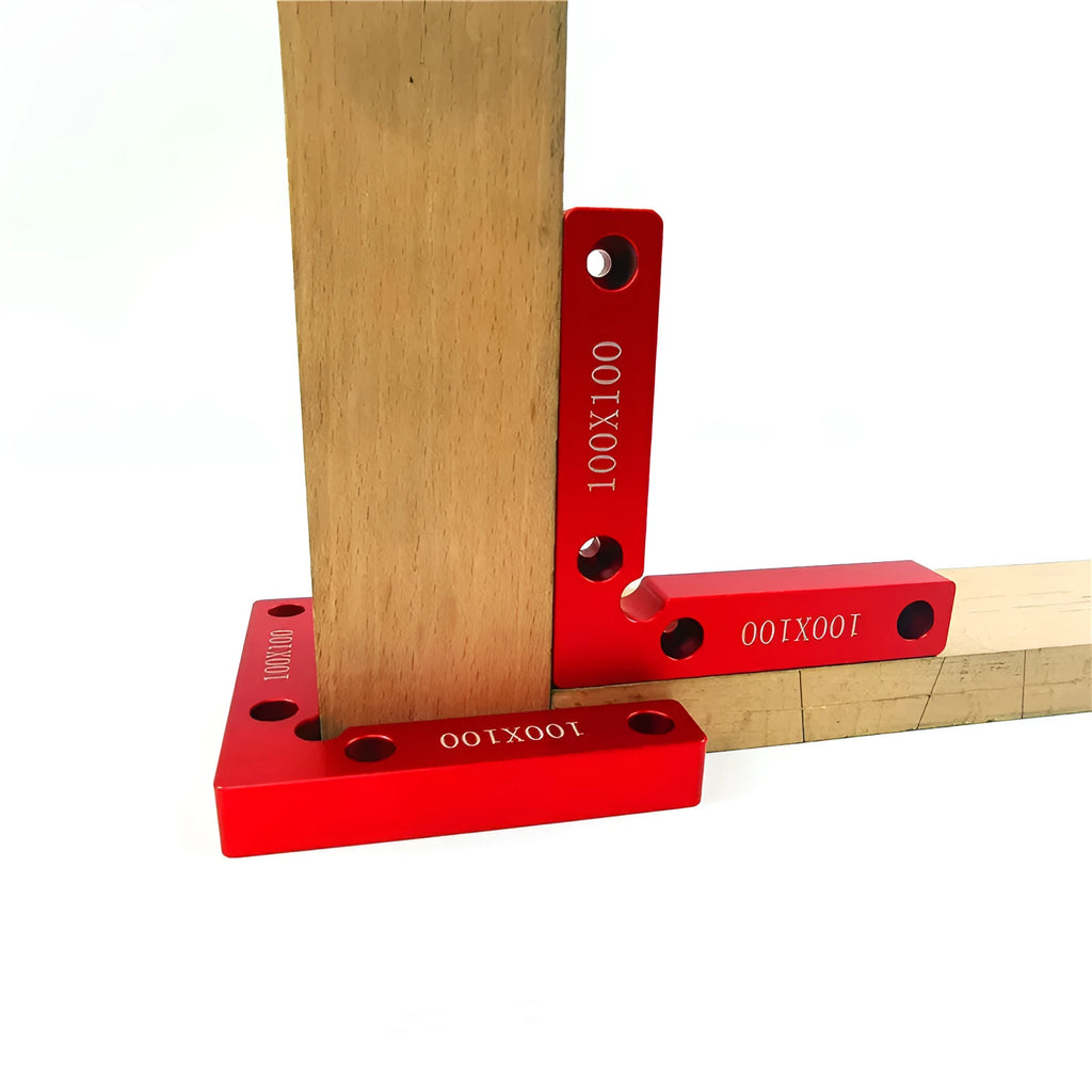 Aluminium woodworking right angle positioning block with scale, shown next to a jigsaw.