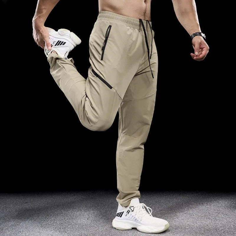 Men's waterproof quick-drying nylon workout trousers with elasticated mid-waist in multiple colour options