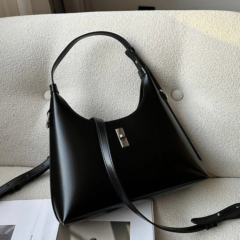 Genuine leather dumpling-shaped crossbody bag in apricot colour with shoulder strap