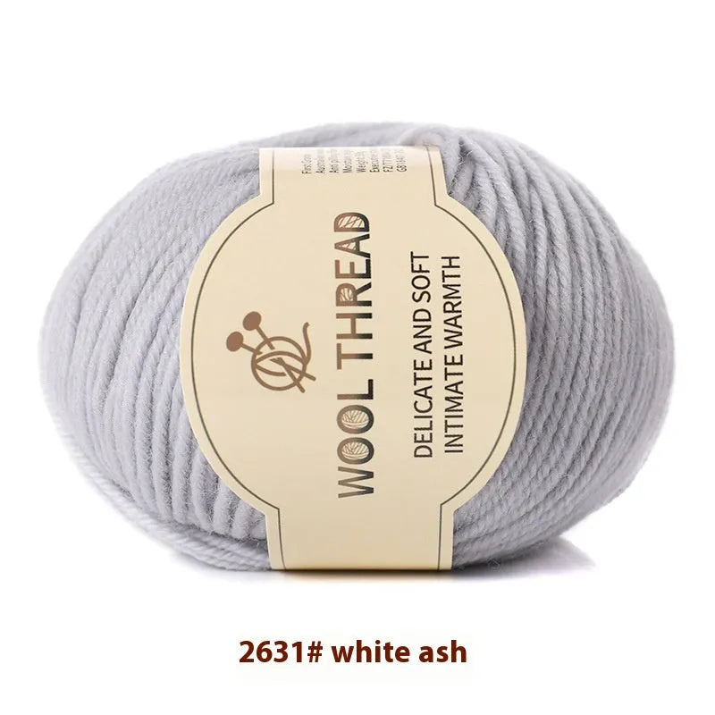 Roll of domestic wool knitting yarn for 10 needles in various colours including green, red, and blue