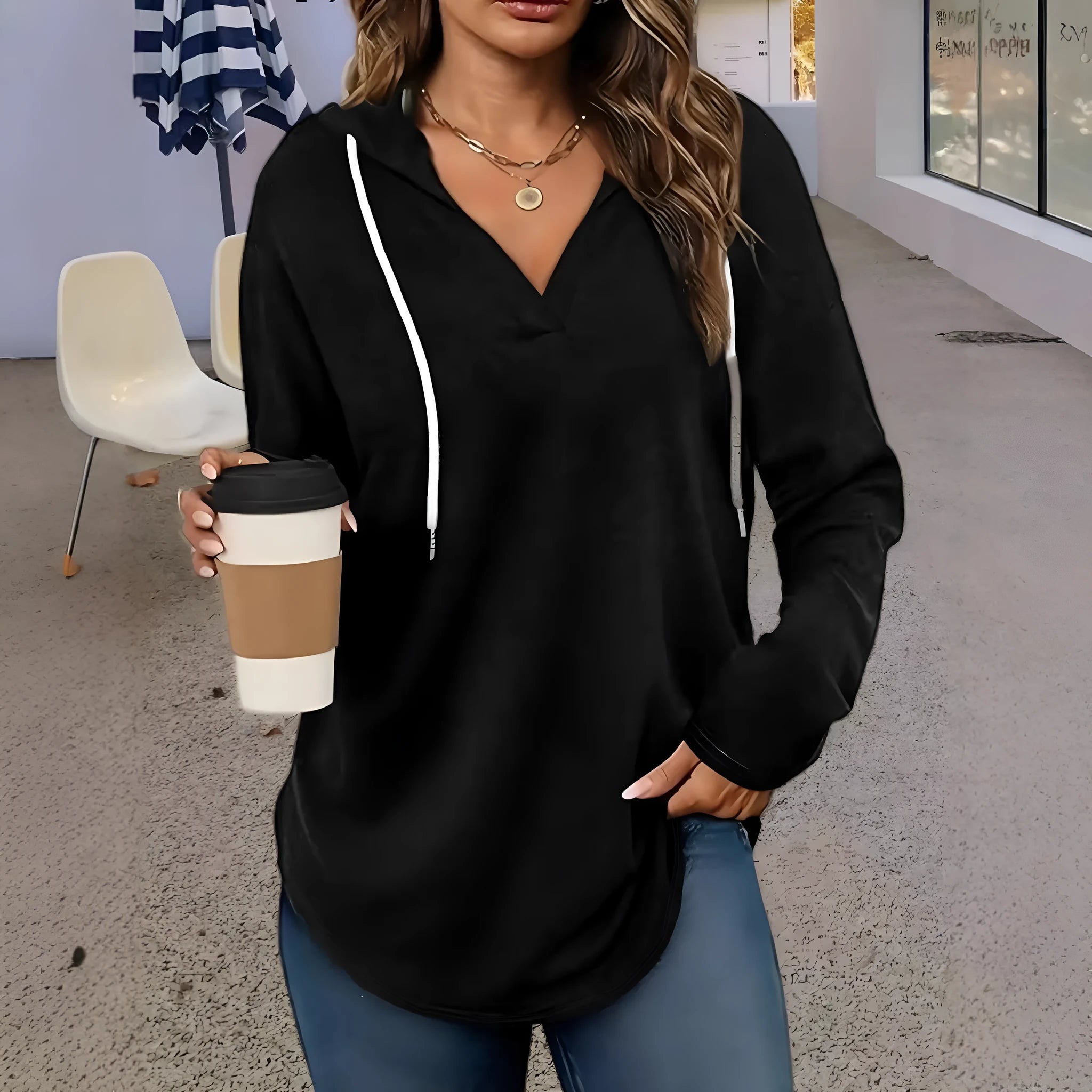 Women's black V-neck hooded sweatshirt with long sleeves on hanger