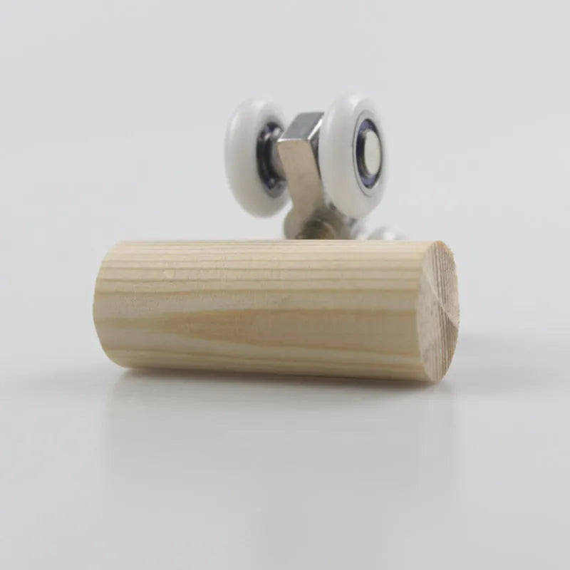 Small rollerskate-shaped bird puzzle toy made of pine and metal measuring 50x20x21mm