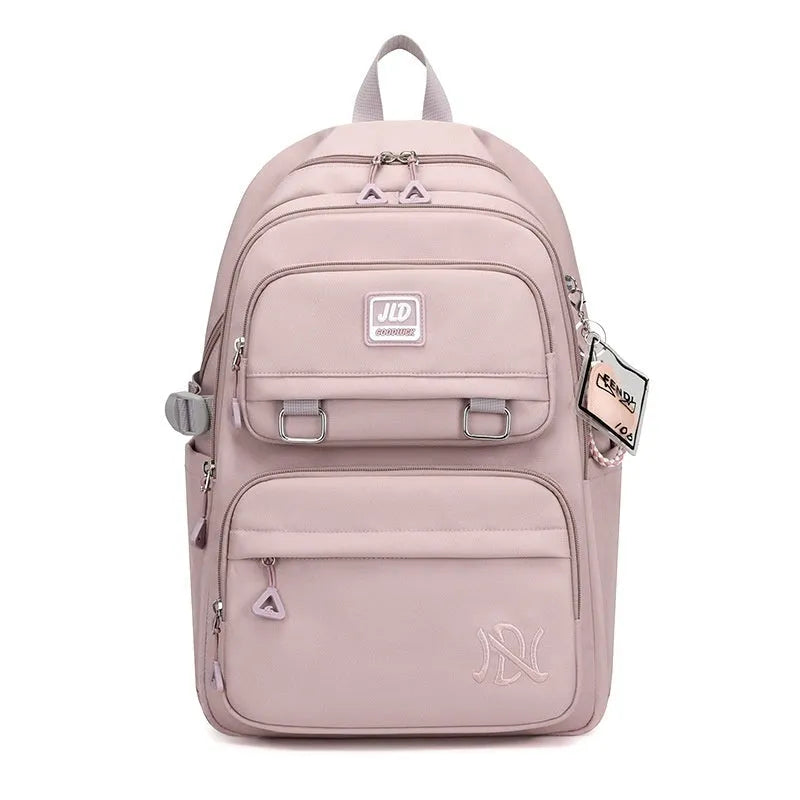 Large capacity nylon school backpack for girls in a choice of colours and patterns, showing ergonomic backplate.