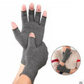Grey fingerless compression glove with thumb hole, made from stretchy spandex fabric.