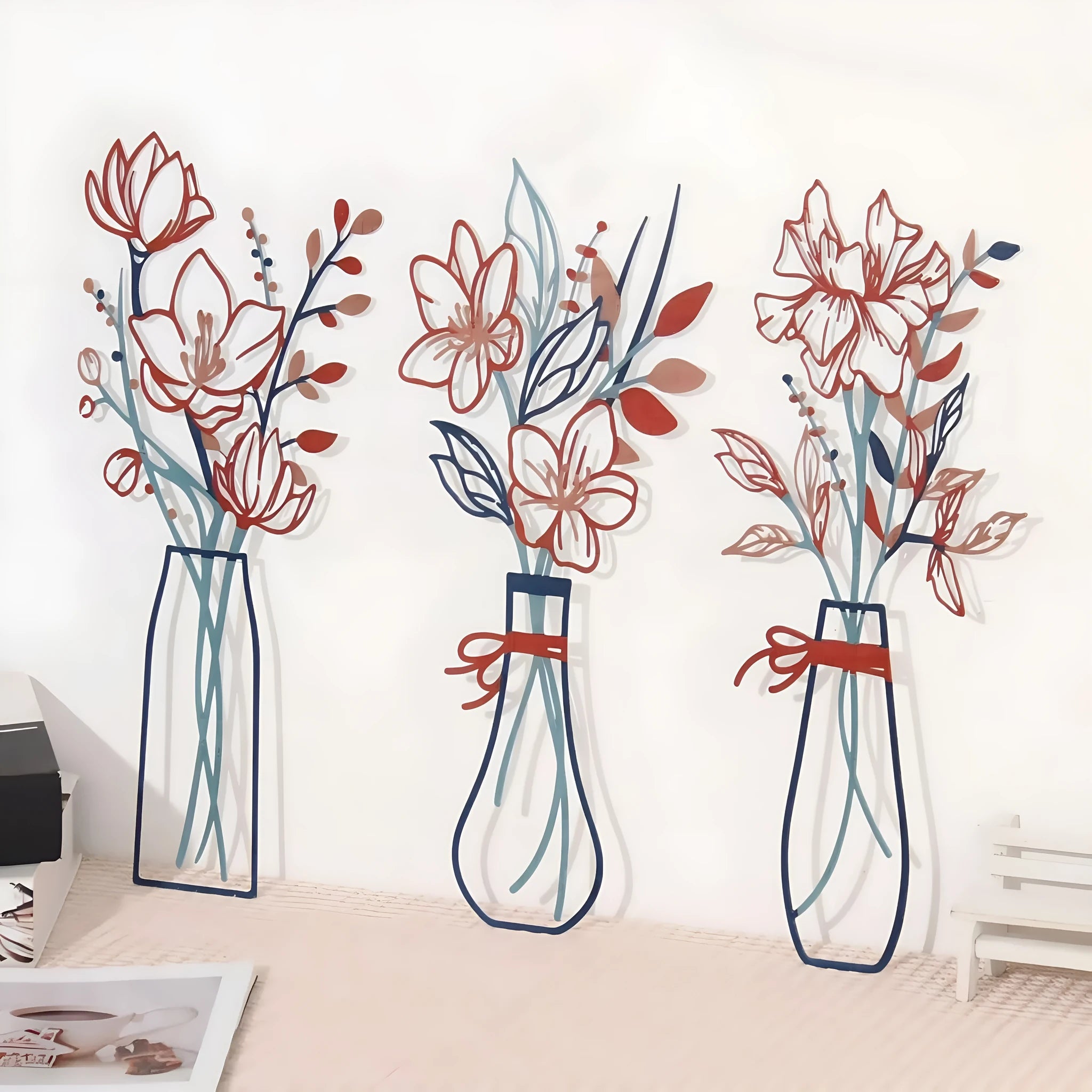 Three-piece metal flowers wall art set in alloy with vase motifs for farmhouse or bathroom decor