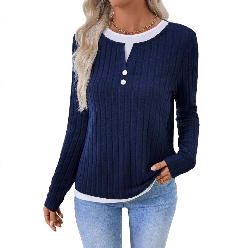 Women's black fake two-piece round neck button pullover sweater with long sleeves on a hanger.