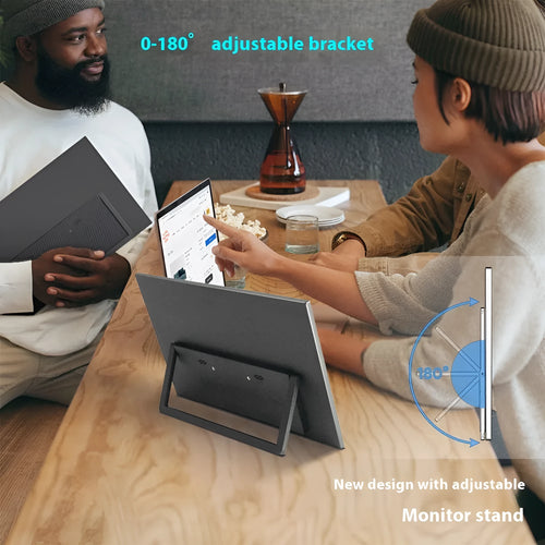 Black 15.6-inch portable computer monitor with integrated adjustable stand on a desk