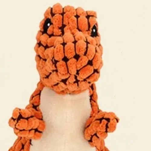 Grey, green, and orange durable dog toys with sound for chewing and boredom relief.