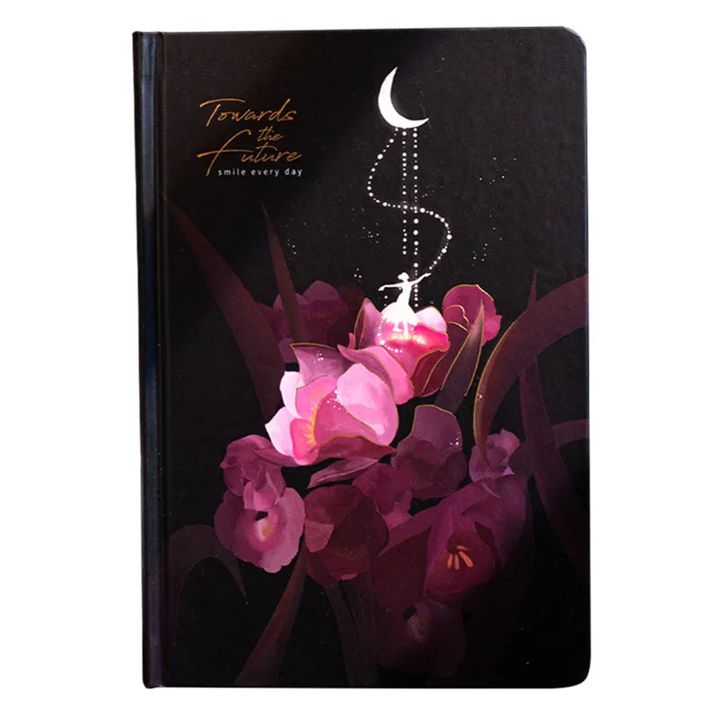 A5 notebook with luminous cover showing colour illustration pages inside, available in Deep Blue, Gold, Light Blue, or Purple colours