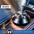 Black metal car air purifier with butterfly design, USB cable, and essential oil bottle.
