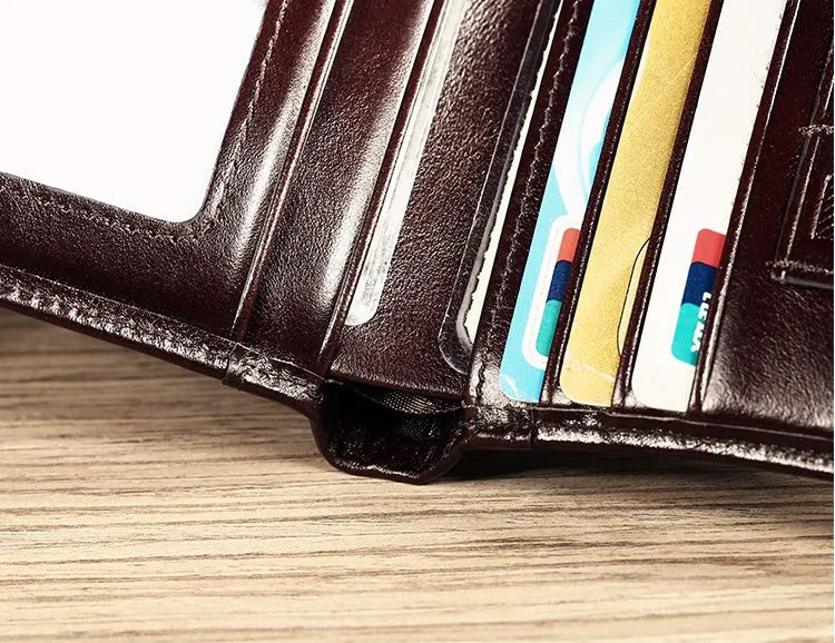 Men's leather wallet showing multiple internal compartments for cards, cash, coins and photos