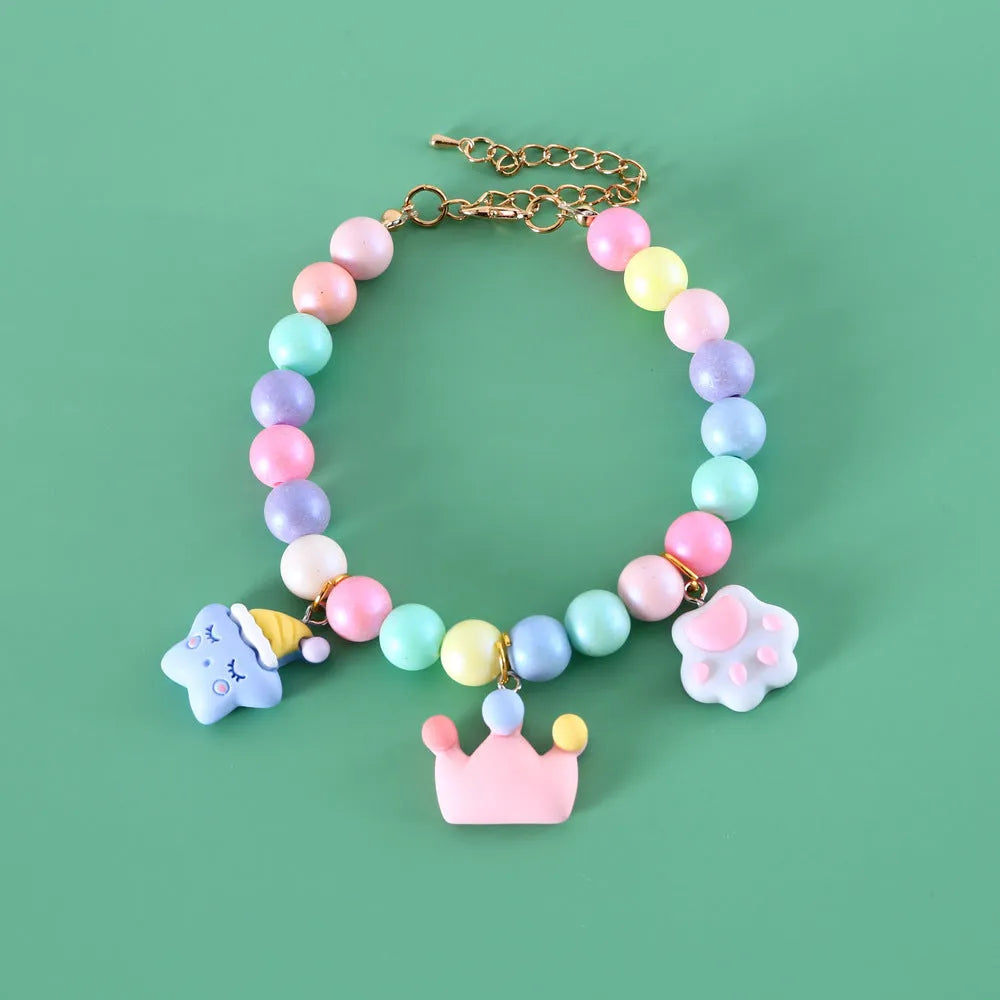 Macaron-themed pet collar accessories in resin with adjustable sizing options