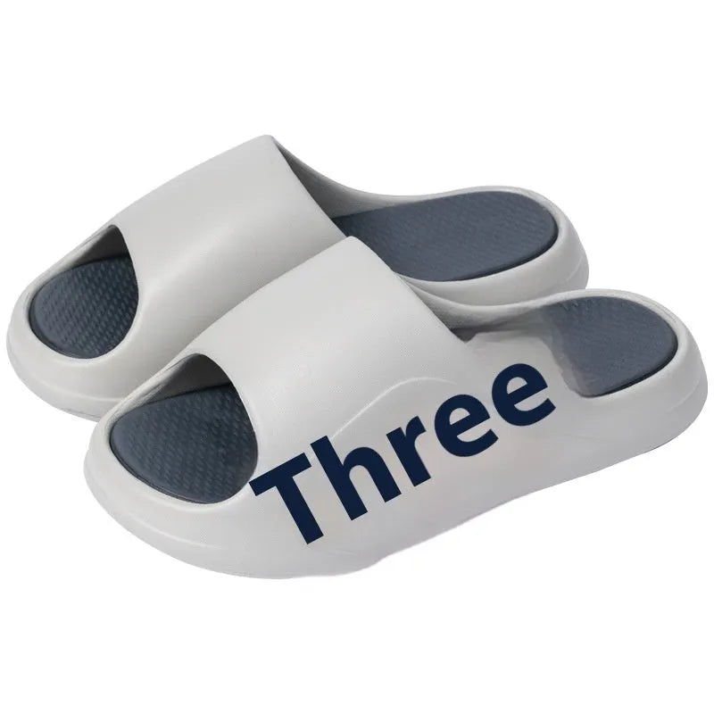 EVA platform slippers with injection moulded sole and letter design in two-tone colour options