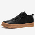Men's black casual leather shoes with round toe, flat heel, and lace-up closure