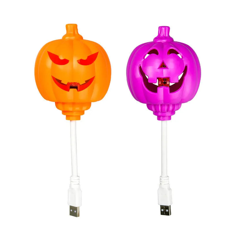 Plastic pumpkin decorative lamp with USB charging port in yellow or purple light options