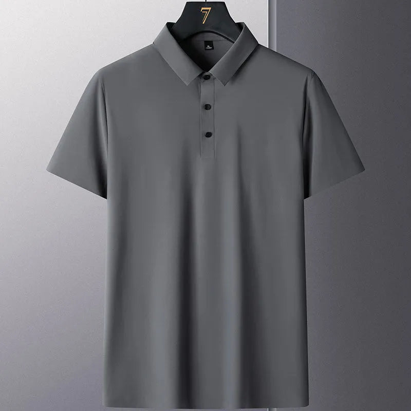 Man wearing a solid colour non-ironing short sleeve casual top in a navy blue shade.