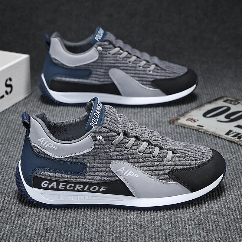 Men's grey and green lightweight mesh running shoes with round toe and lace-up front