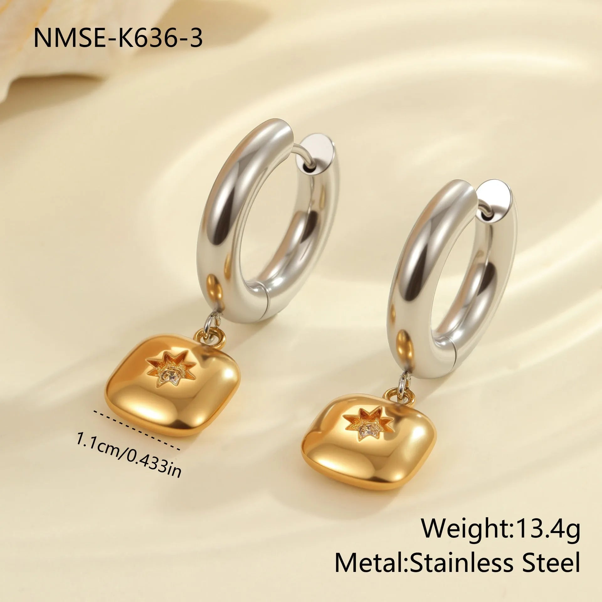 Christmas tree shaped stainless steel earrings with 18K gold electroplated finish and heart star geometric accents