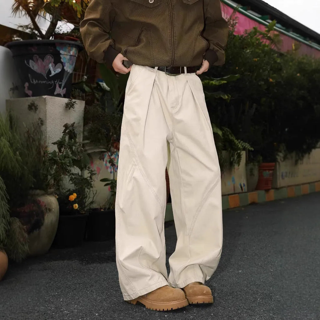 Men's pleated straight-leg trousers in black colour showing front design with micro-elastic fabric