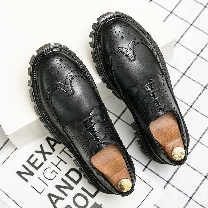 Men's black brogue leather shoes with round toe and traditional brogue detailing