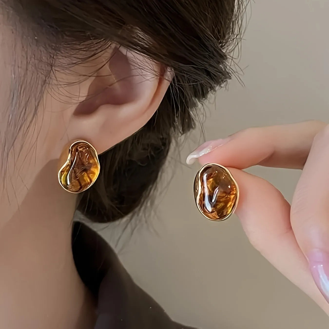 Handmade alloy earrings set showing three geometric designs: irregular amber, wafer disc and water drop tigereye styles