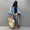 Printed loose cotton bikini cover-up blouse on hanger showing multiple DN0712 colour options.