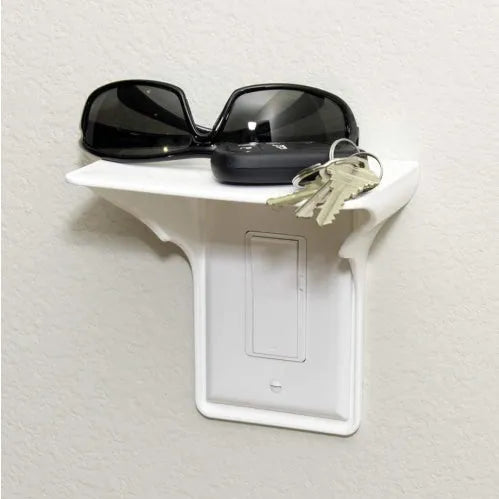 White plastic socket storage rack organiser with 14 cm length, 10 cm width, and 15 cm height.